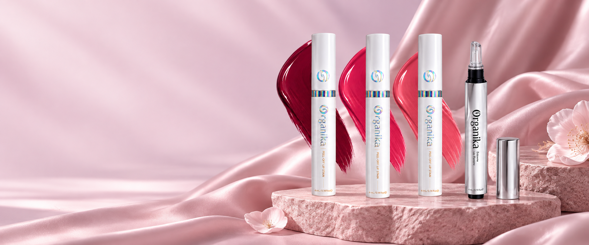 Lip Tattoos et XXL Lip Plumper Organika sur satin rose